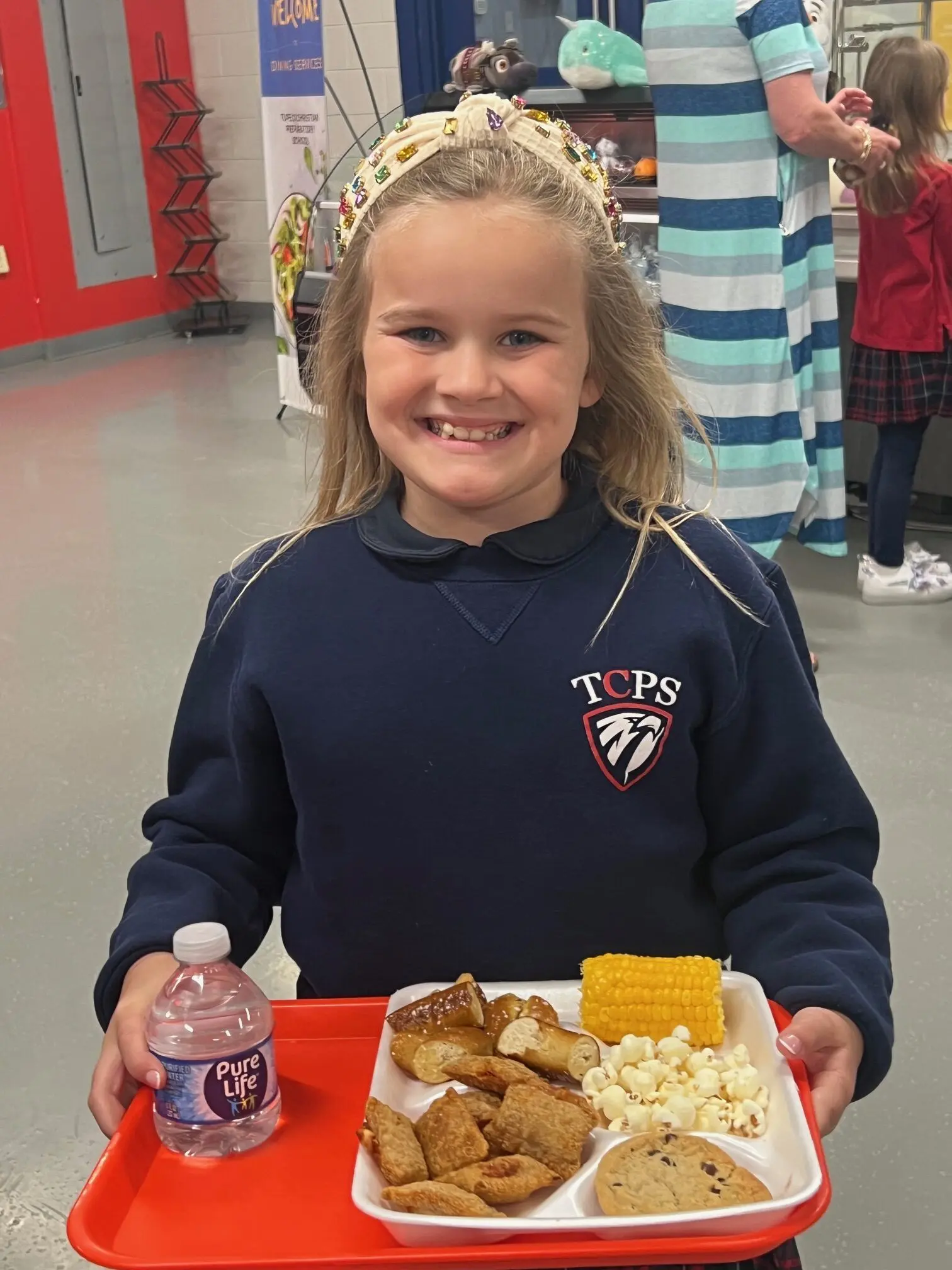 child with tray